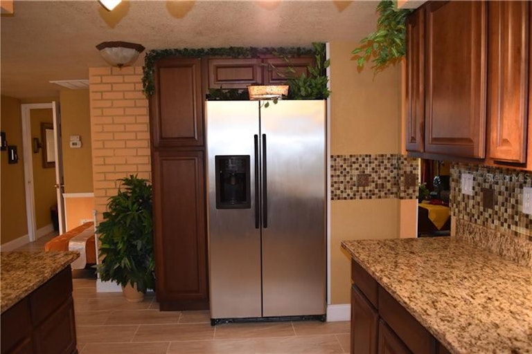 Photo 11 of 25 - 12416 Cobble Stone Dr, Hudson, FL 34667