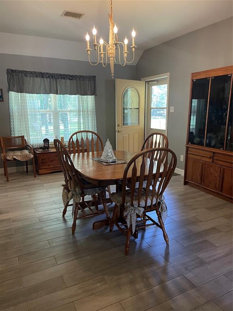 Photo 12 of 16 - 3688 White Oak Dr, Conroe, TX 77301