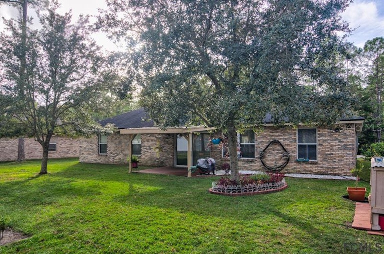Photo 32 of 35 - 72 Red Mill Dr, Palm Coast, FL 32164