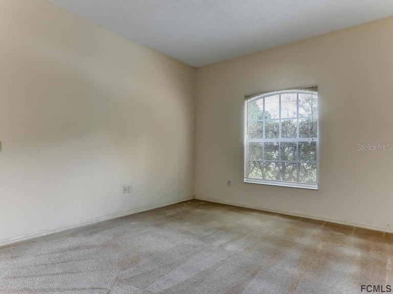 Photo 27 of 43 - 8 Pine Cedar Dr, Palm Coast, FL 32164