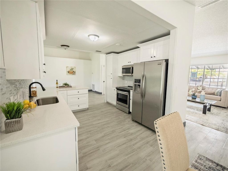 Photo 12 of 38 - 1902 Paragon St, Deltona, FL 32738