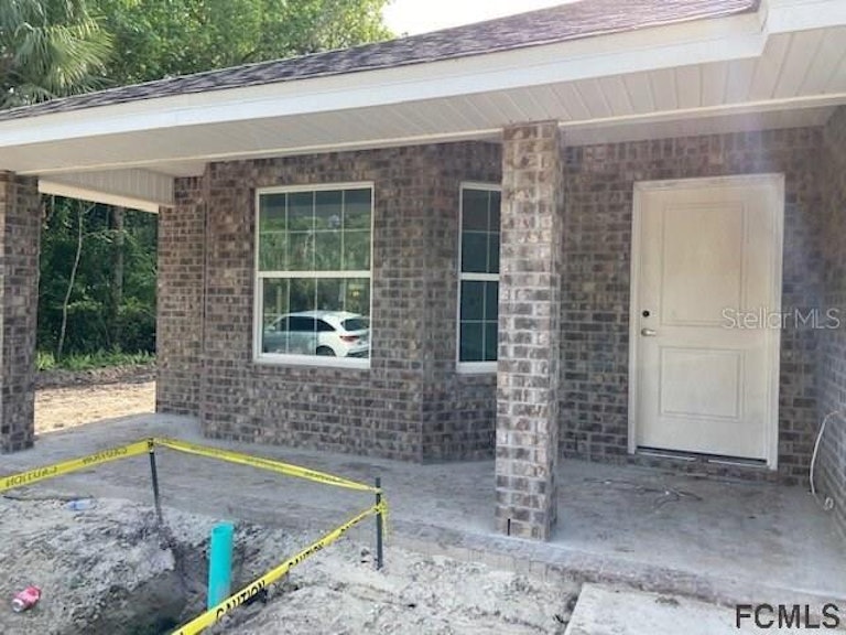 Photo 4 of 15 - 138 Sea Trl, Palm Coast, FL 32164