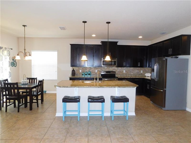Photo 13 of 24 - 2646 Kenchester Loop, Wesley Chapel, FL 33543