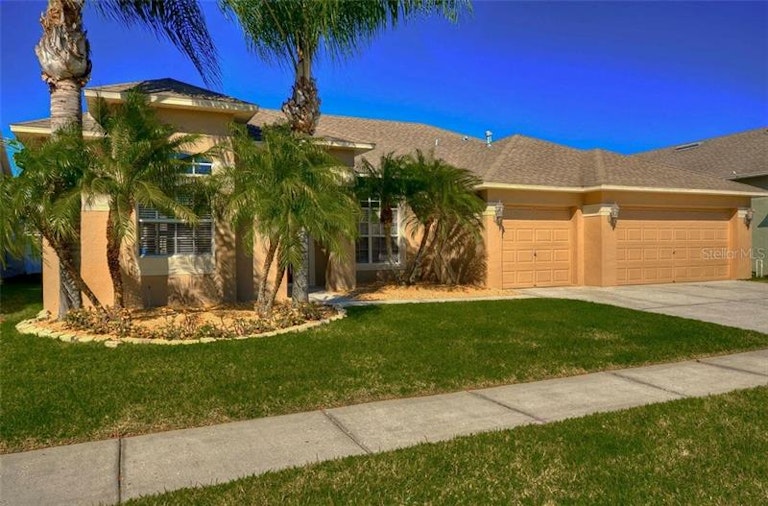 Photo 1 of 25 - 14827 Coral Berry Dr, Tampa, FL 33626