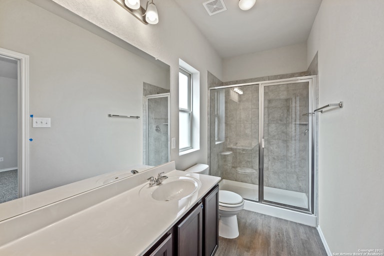 Photo 12 of 19 - 9311 Somers Bnd, San Antonio, TX 78211