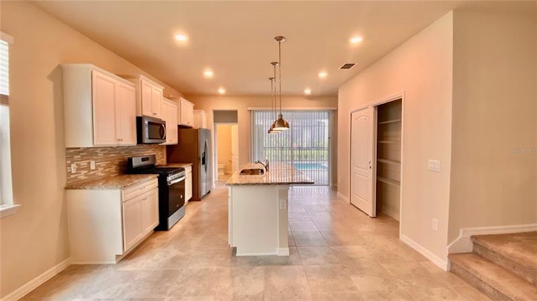 Photo 15 of 64 - 7188 Oakmoss Loop, Davenport, FL 33837