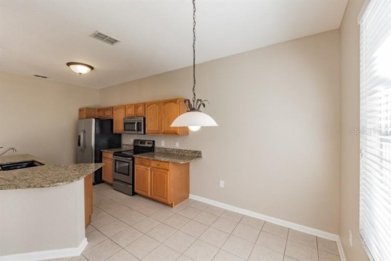 Photo 5 of 25 - 7743 Basnett Cir, Kissimmee, FL 34747