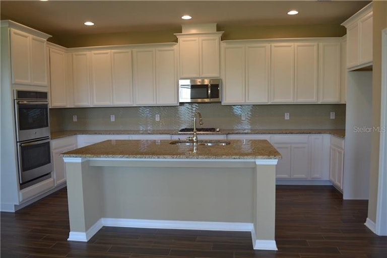 Photo 5 of 25 - 7019 Brown Pelican Ct #76, Winter Garden, FL 34787
