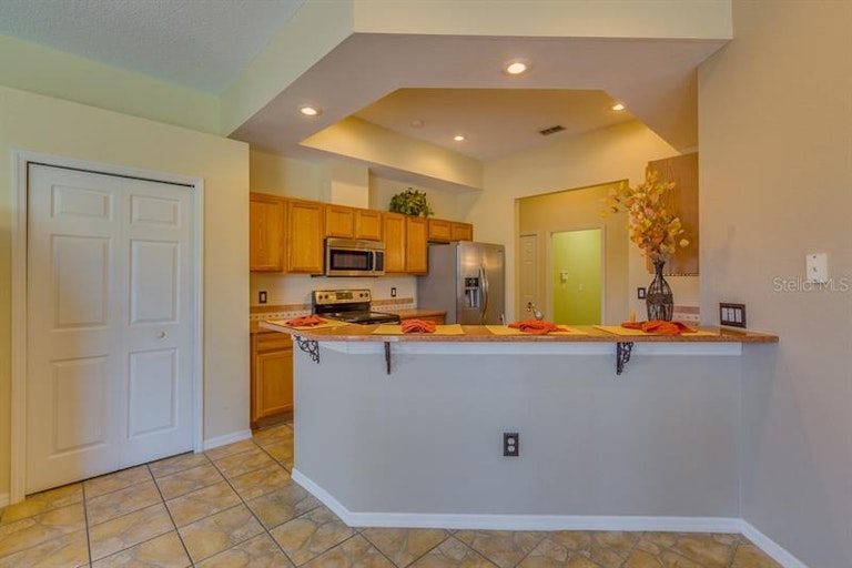 Photo 12 of 25 - 9118 Flagstick Ln, Hudson, FL 34667