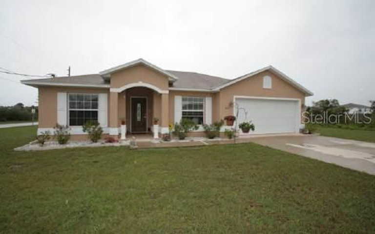 Photo 1 of 1 - 102 Laramie Dr, Palm Coast, FL 32137