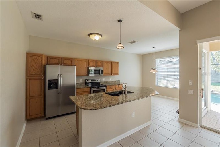Photo 4 of 25 - 7743 Basnett Cir, Kissimmee, FL 34747