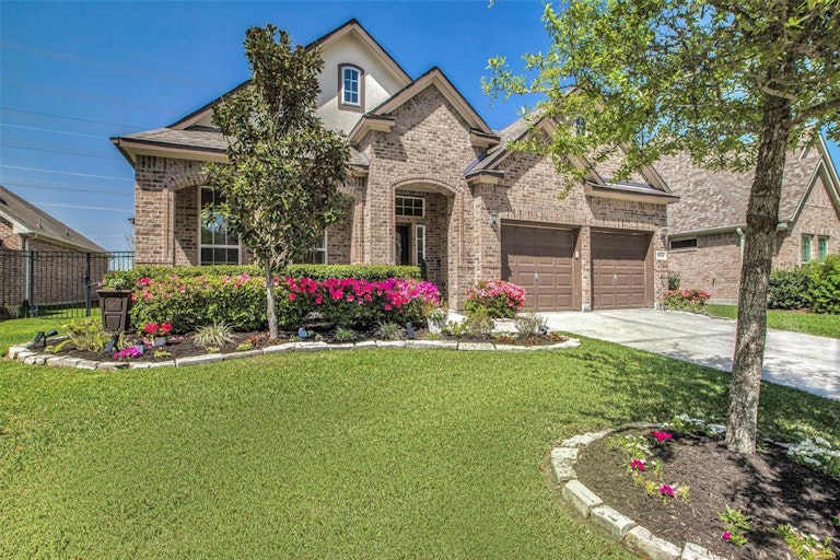 Photo 2 of 34 - 9315 Mystic Falls Ln, Humble, TX 77396