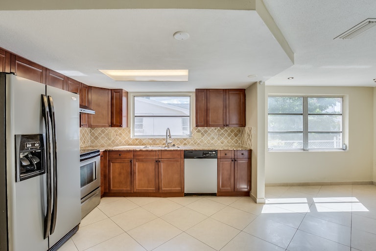 Photo 3 of 14 - 9605 Rainbow Ln, Port Richey, FL 34668