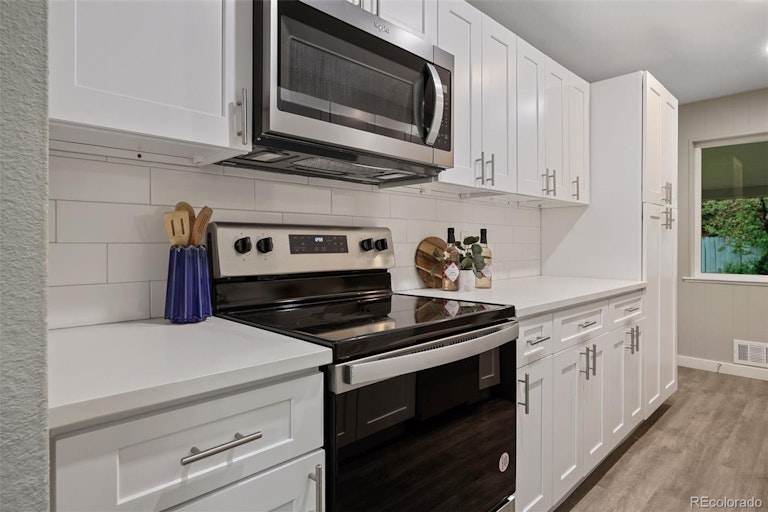 Photo 15 of 35 - 1545 S Chase Ct, Lakewood, CO 80232