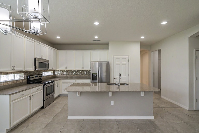 Photo 4 of 29 - 3343 Bethpage Loop, Mount Dora, FL 32757