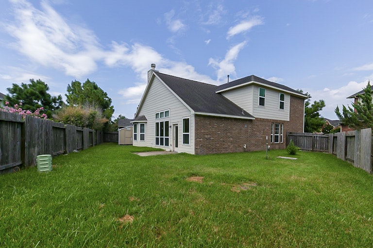 Photo 7 of 31 - 5703 Langham Dawn Ln, Houston, TX 77084