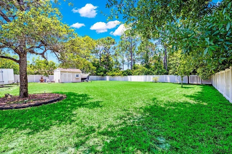 Photo 52 of 60 - 52 Rockefeller Dr, Palm Coast, FL 32164