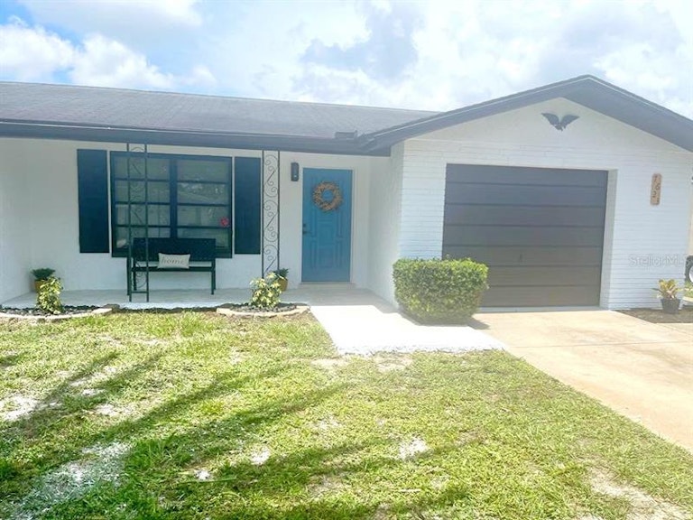 Photo 8 of 48 - 7623 Lotus Dr, Port Richey, FL 34668