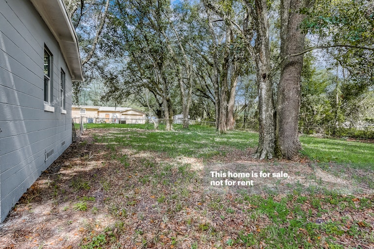 Photo 15 of 29 - 4030 Lockhart Dr N, Jacksonville, FL 32209