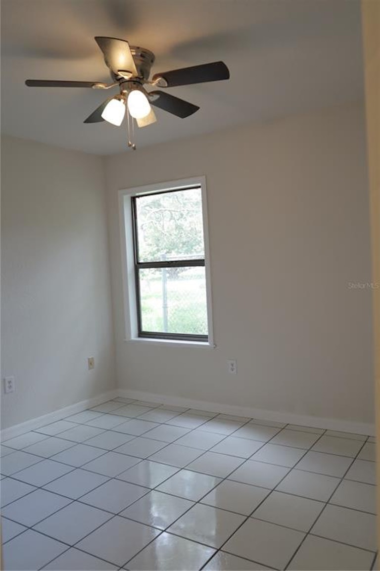Photo 11 of 19 - 8321 Philadelphia Ave, Spring Hill, FL 34608