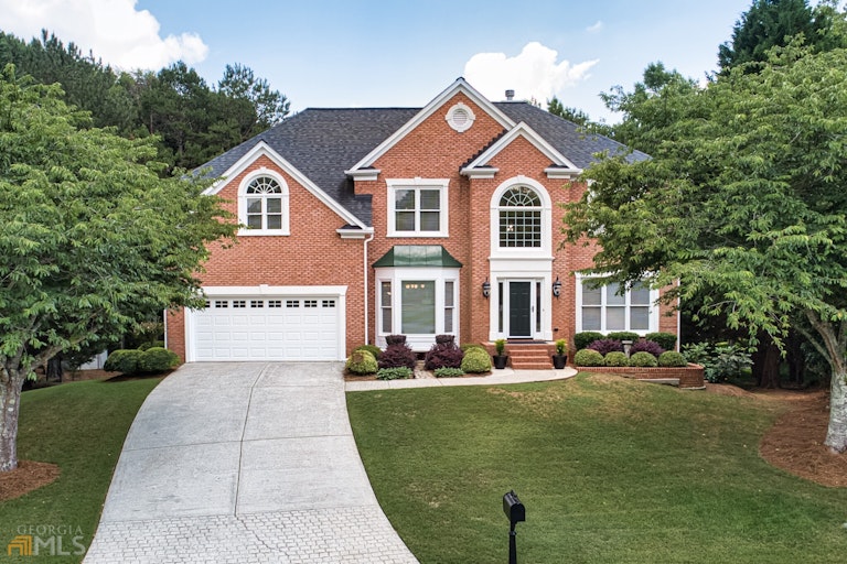 Photo 1 of 56 - 10895 Regal Forest Dr, Suwanee, GA 30024