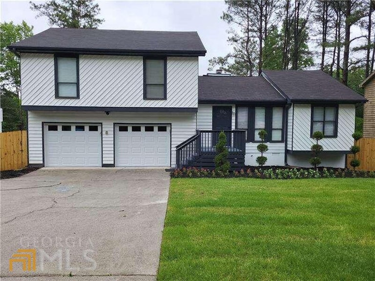 Photo 1 of 38 - 2860 Mountbery Dr, Snellville, GA 30039