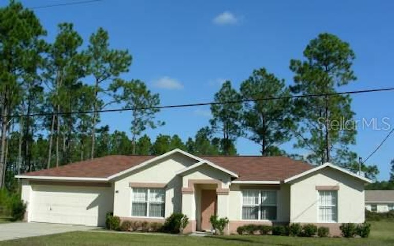 Photo 1 of 1 - 83 Rickenbacker Dr, Palm Coast, FL 32164