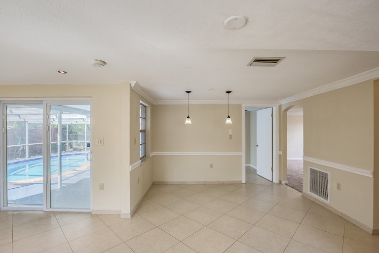Photo 5 of 14 - 9605 Rainbow Ln, Port Richey, FL 34668
