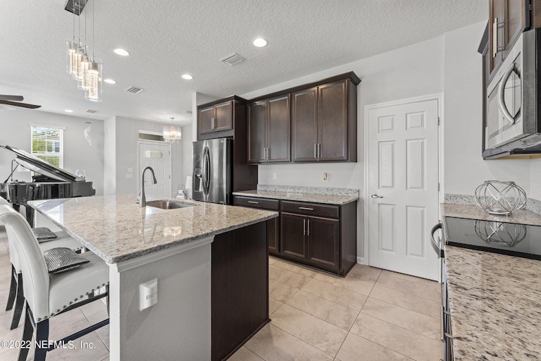 Photo 14 of 43 - 14987 Rain Lily St, Jacksonville, FL 32258