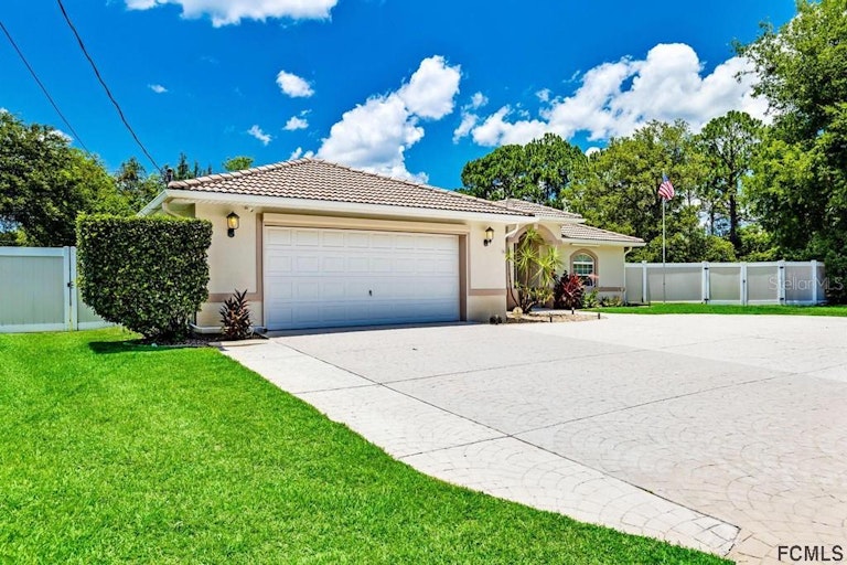 Photo 53 of 60 - 52 Rockefeller Dr, Palm Coast, FL 32164