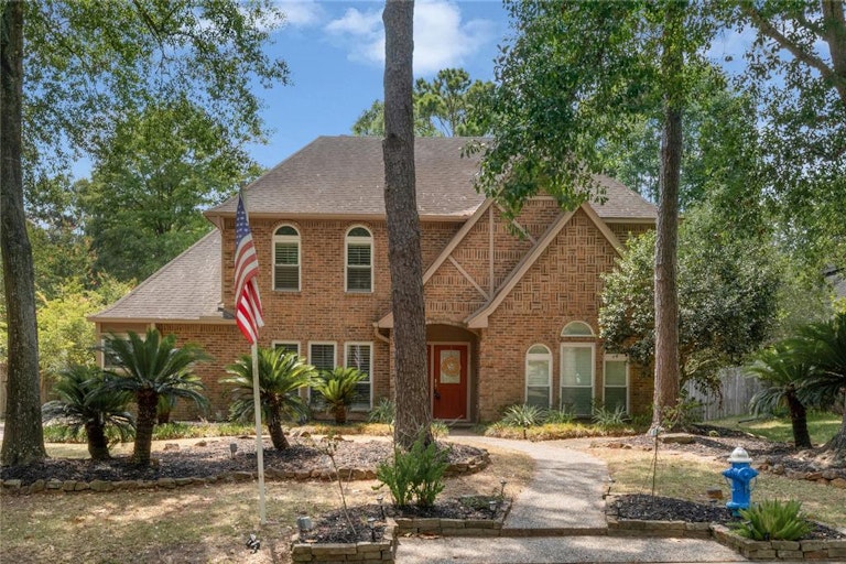 Photo 1 of 41 - 2715 Rustic Woods Dr, Kingwood, TX 77345
