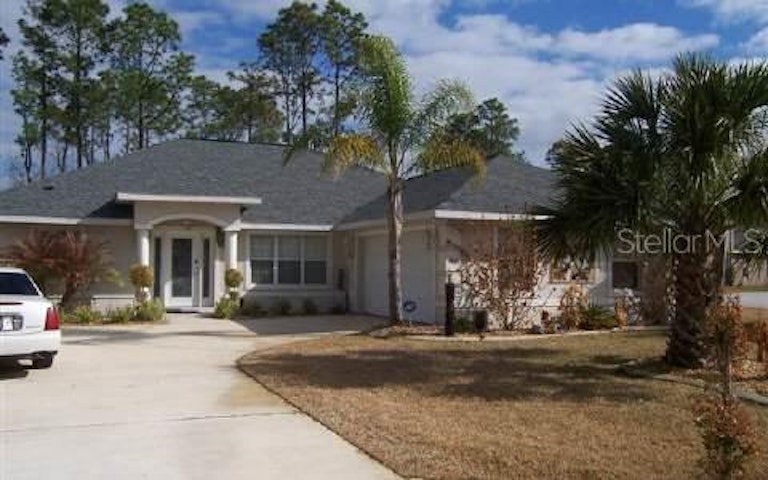Photo 1 of 1 - 49 Round Tree Dr, Palm Coast, FL 32164