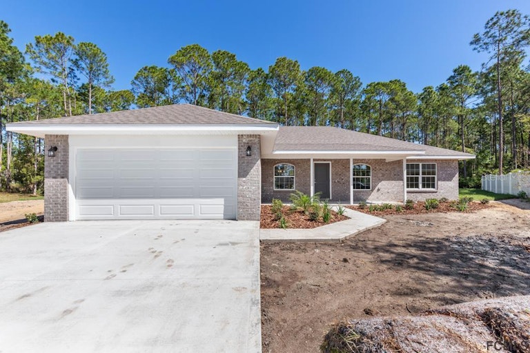Photo 2 of 42 - 36 Riverdale Ln, Palm Coast, FL 32164