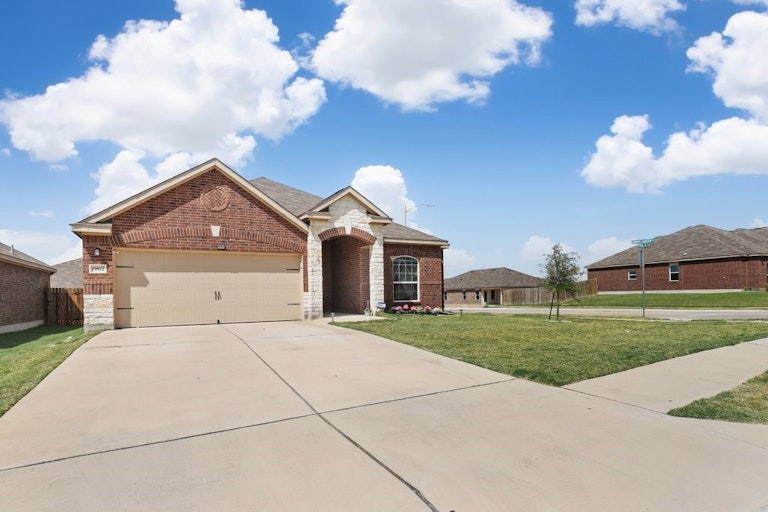 Photo 1 of 28 - 19812 Woodrow Wilson St, Manor, TX 78653