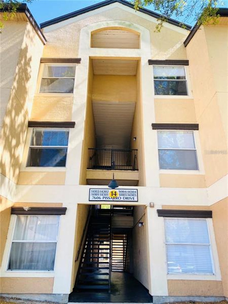 Photo 1 of 17 - 7606 Pissarro Dr #14303, Orlando, FL 32819