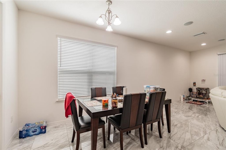 Photo 9 of 47 - 7059 Scarlet Cedar Dr, Wesley Chapel, FL 33545