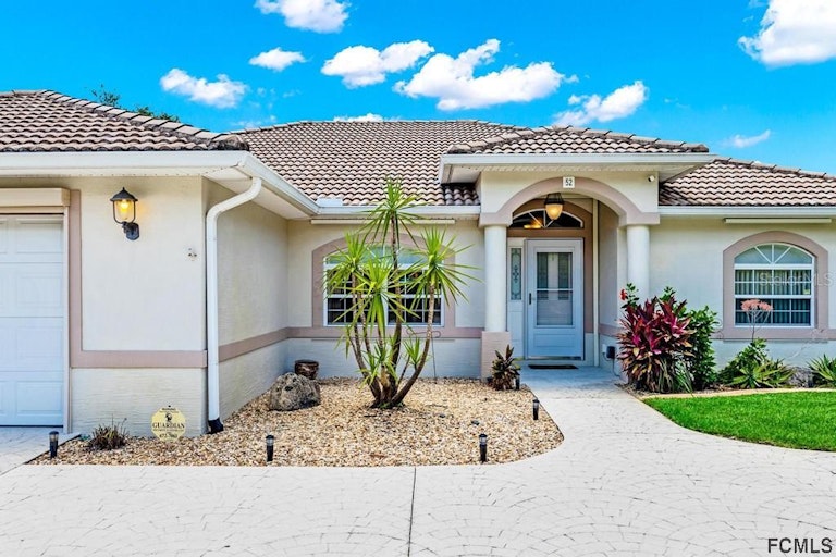 Photo 2 of 60 - 52 Rockefeller Dr, Palm Coast, FL 32164