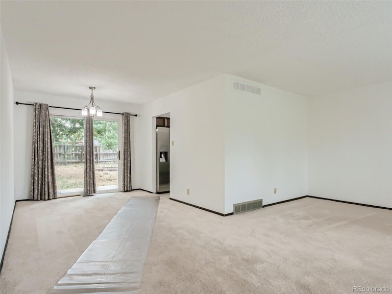 Photo 11 of 28 - 5528 Carson St, Denver, CO 80239