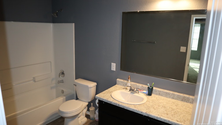 Photo 14 of 15 - 7322 Net Valley Dr, San Antonio, TX 78242