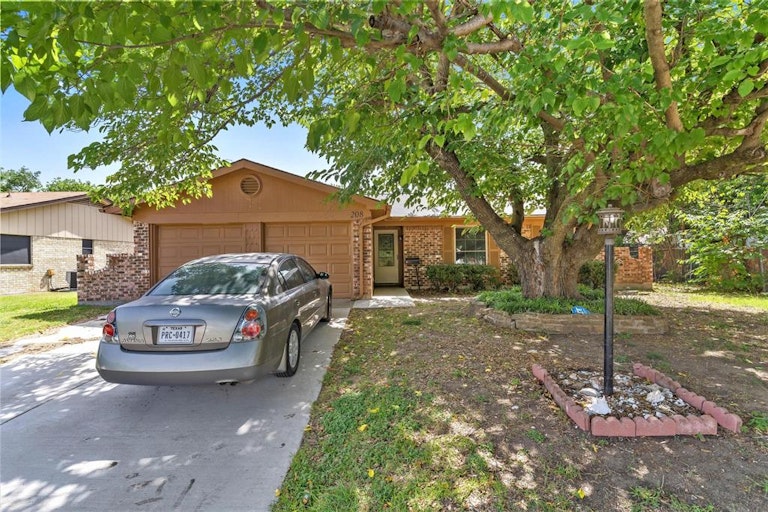 Photo 1 of 21 - 208 NW Suzanne Ter, Burleson, TX 76028