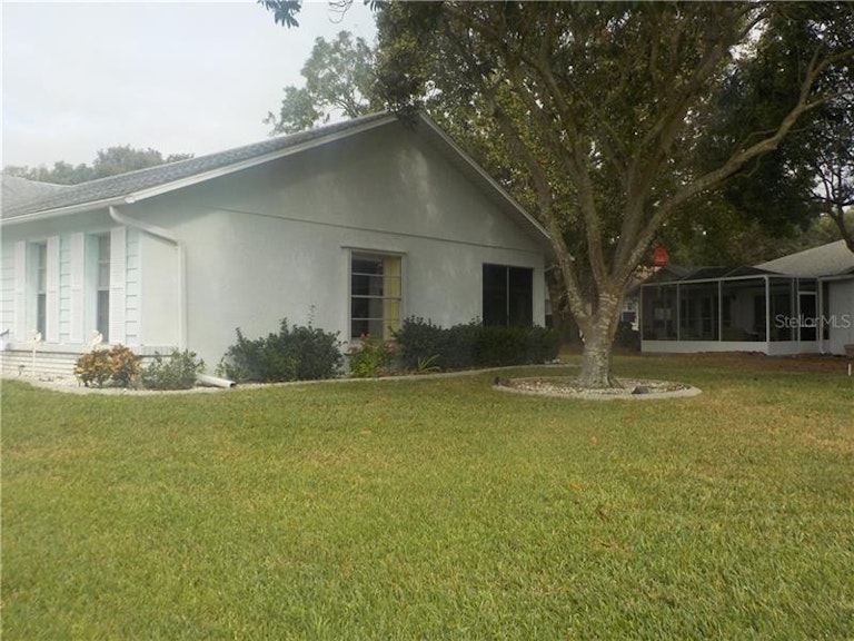 Photo 2 of 13 - 9651 Cavendish Ct, New Port Richey, FL 34655