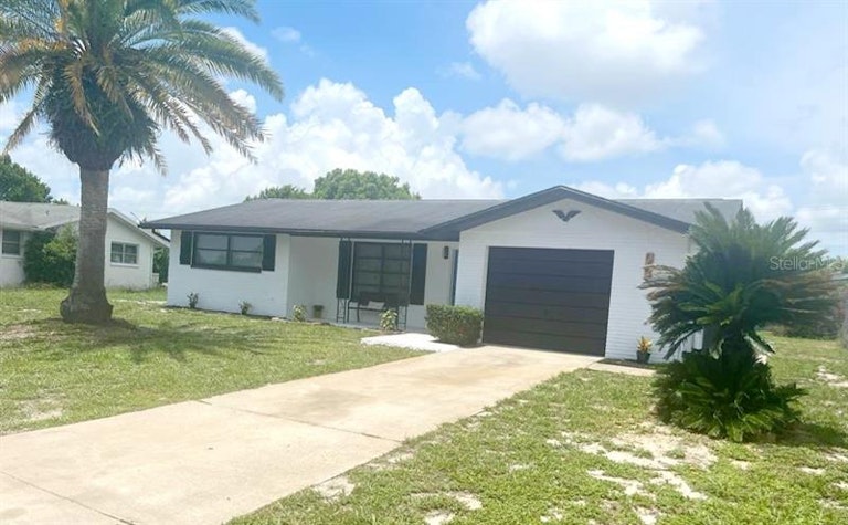 Photo 7 of 48 - 7623 Lotus Dr, Port Richey, FL 34668