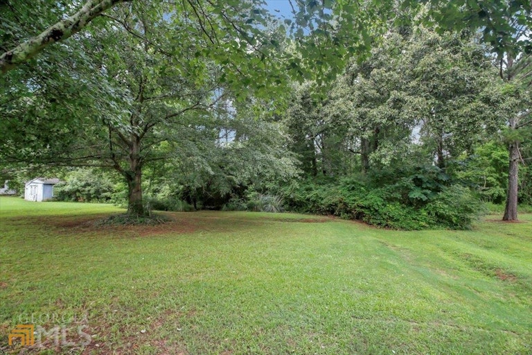 Photo 6 of 22 - 11525 Matthews Trl, Hampton, GA 30228
