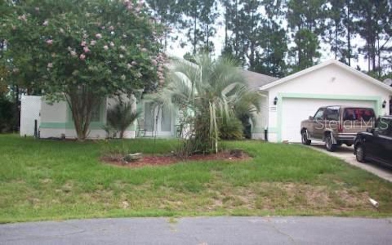 Photo 1 of 4 - 16 Promenade Pl, Palm Coast, FL 32164