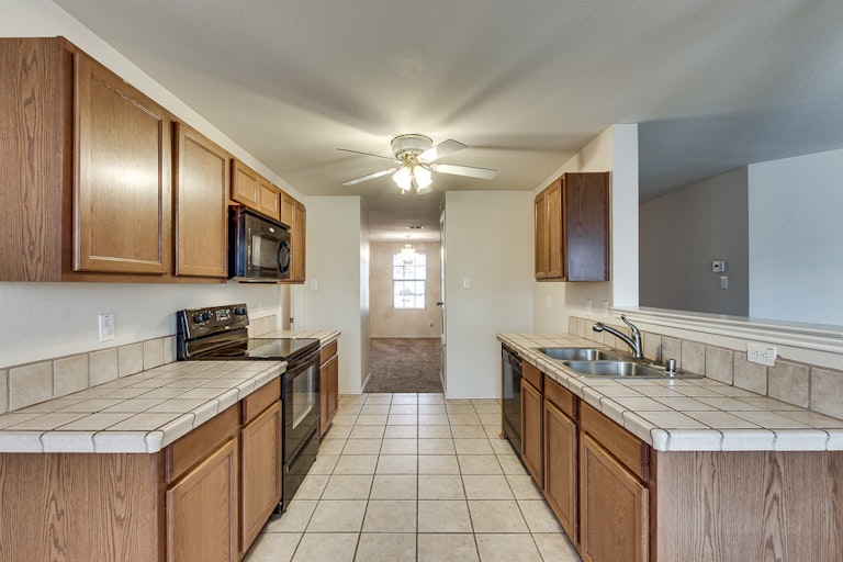 Photo 12 of 28 - 609 Rosemary Dr, Royse City, TX 75189
