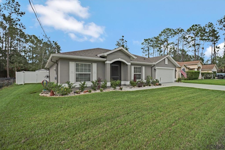 Photo 2 of 40 - 39 Rickenbacker Dr, Palm Coast, FL 32164