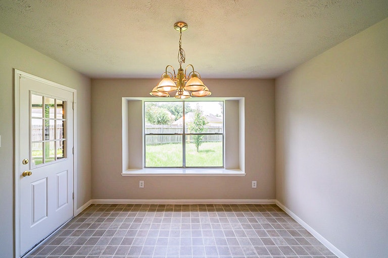 Photo 12 of 35 - 2731 Briarloch Ln, Houston, TX 77073