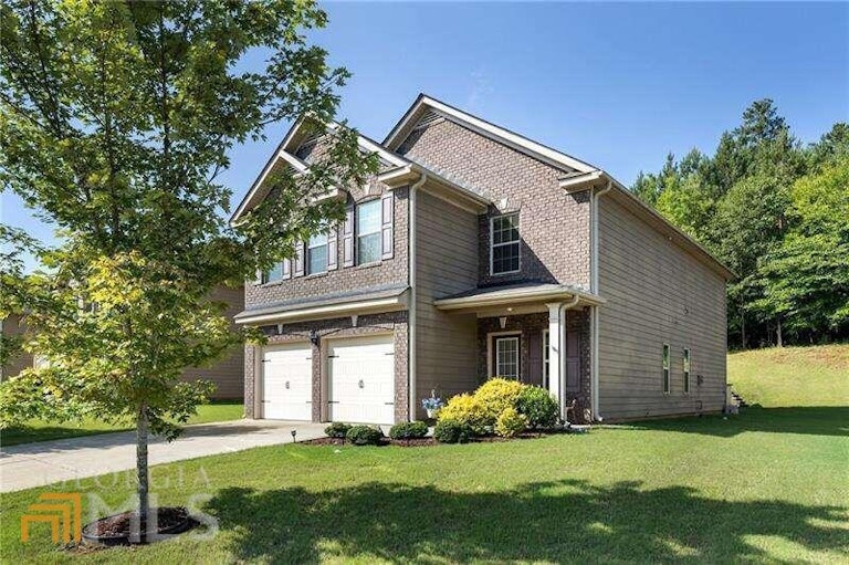 Photo 2 of 24 - 651 Silver Oak Dr, Dallas, GA 30132