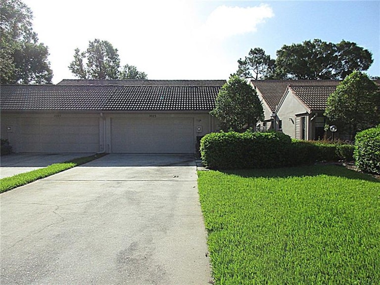 Photo 1 of 21 - 3023 Windmoor Dr S, Palm Harbor, FL 34685