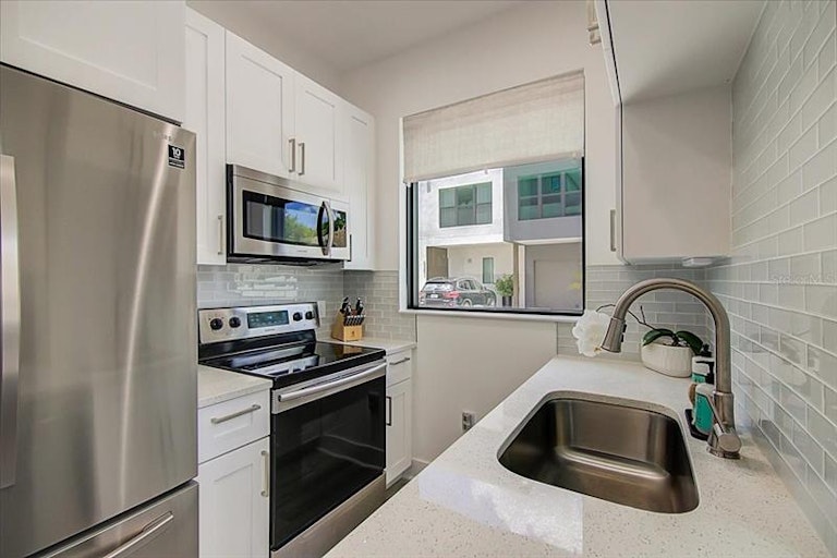 Photo 7 of 42 - 8723 Palm Ranches Pl, Tampa, FL 33614